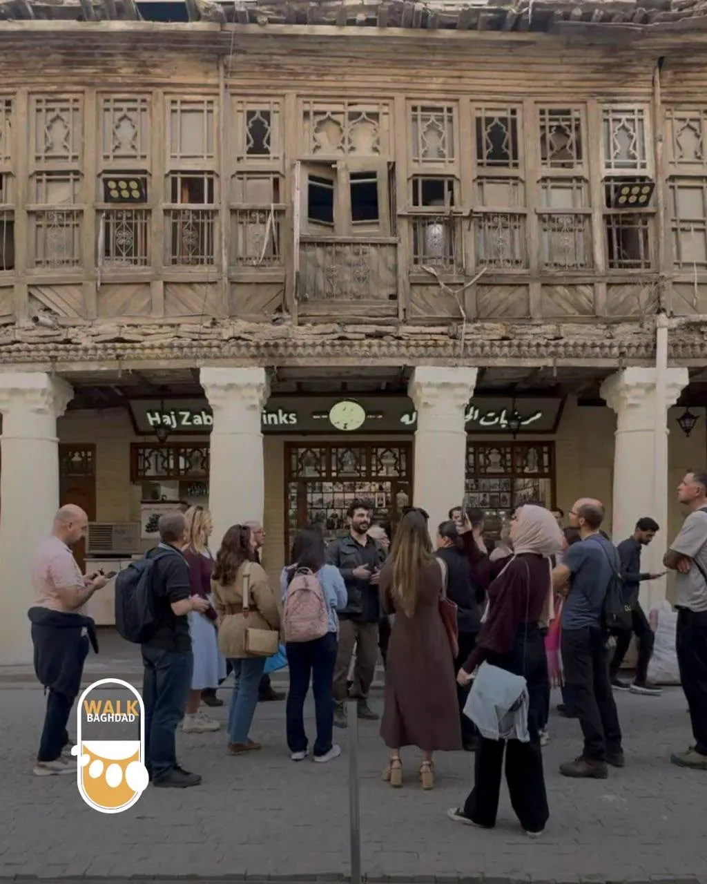 Osamah Mousa leading a Baghdad walking tour group